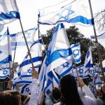 Follow The Money: AIPAC Rewires 2026 Crowd waving Israeli flags outdoors