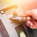 Bank Of America Oops – Barber Makes A Call Hand inserting bank card into ATM slot