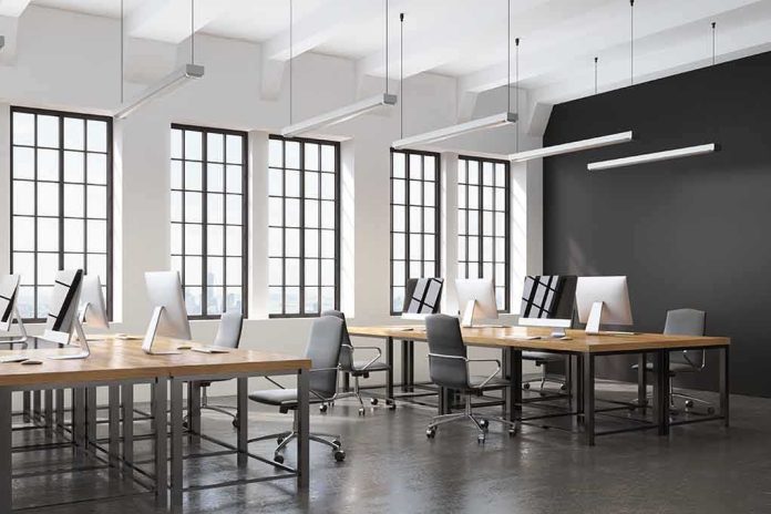 modern open-plan office with large windows and desks