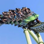 Roller Coaster Tragedy Sparks Major Crimes Probe roller coaster train with riders on a curved track