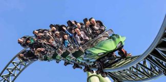 Roller Coaster Tragedy Sparks Major Crimes Probe roller coaster train with riders on a curved track